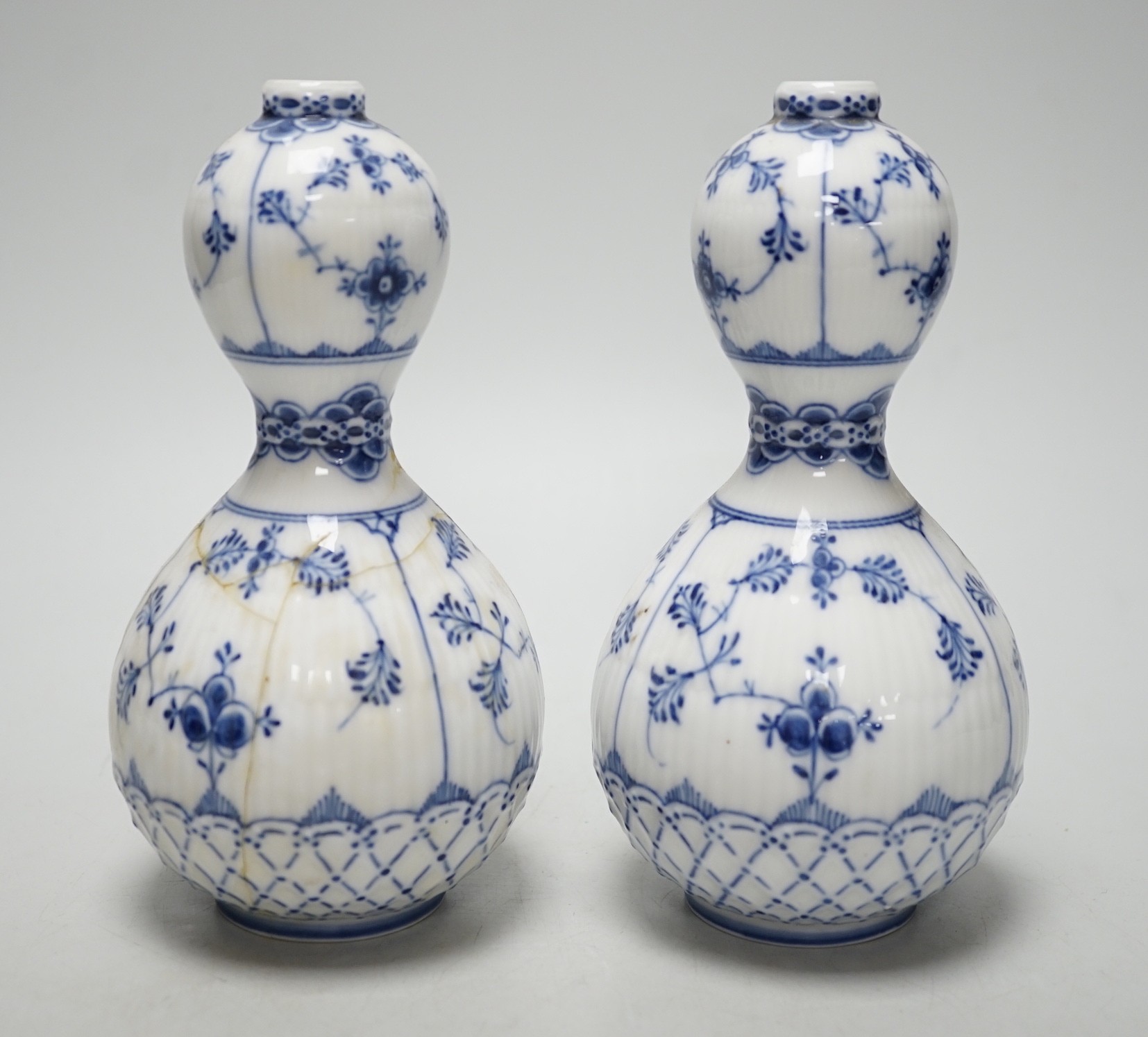 A pair of Royal Copenhagen onion pattern vases, 17cm
